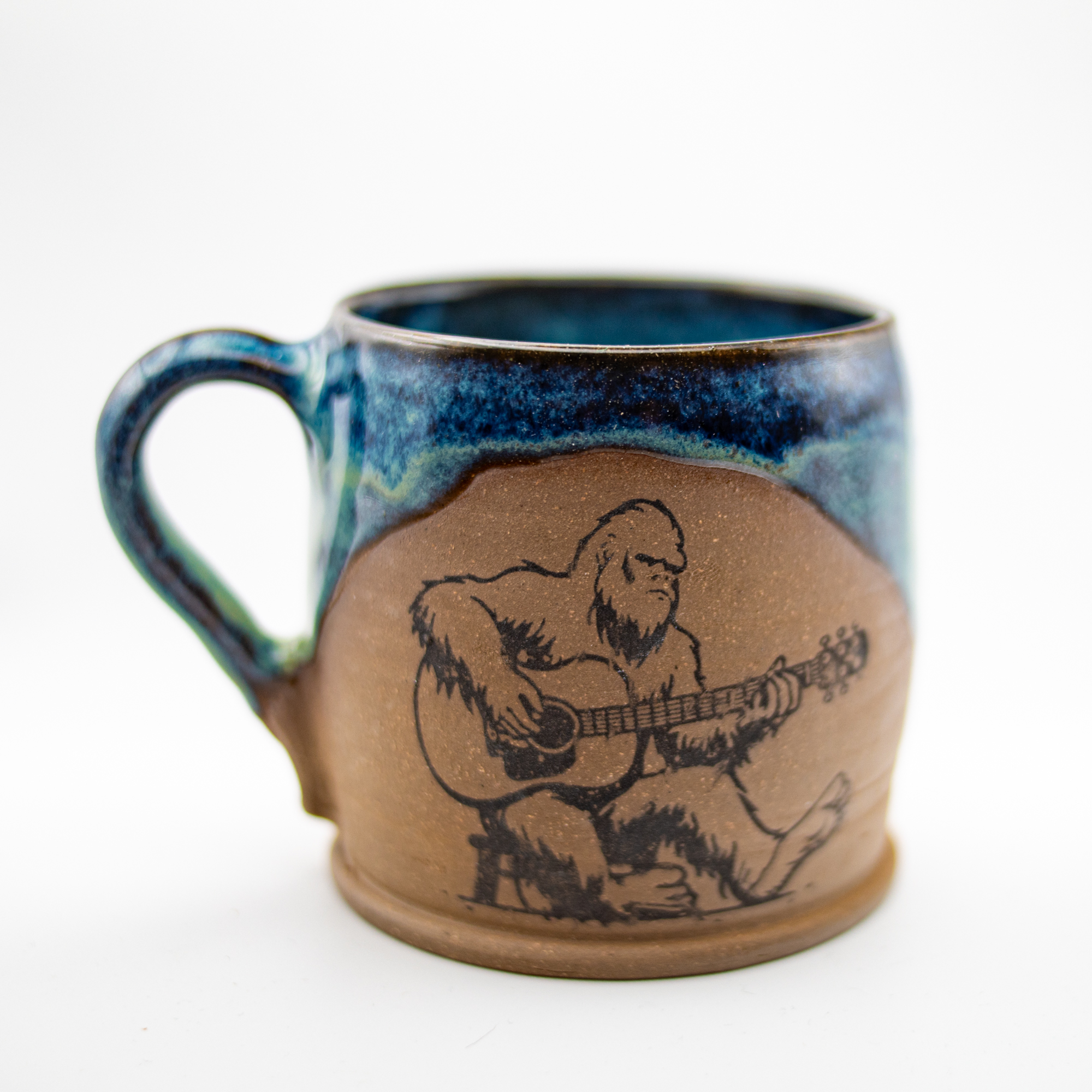 Handmade Bigfoot playing guitar mug